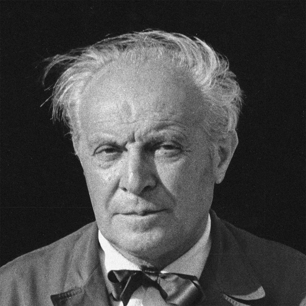 Black-and-white portrait of Italian architect and designer Gio Ponti in a suit and bow tie
